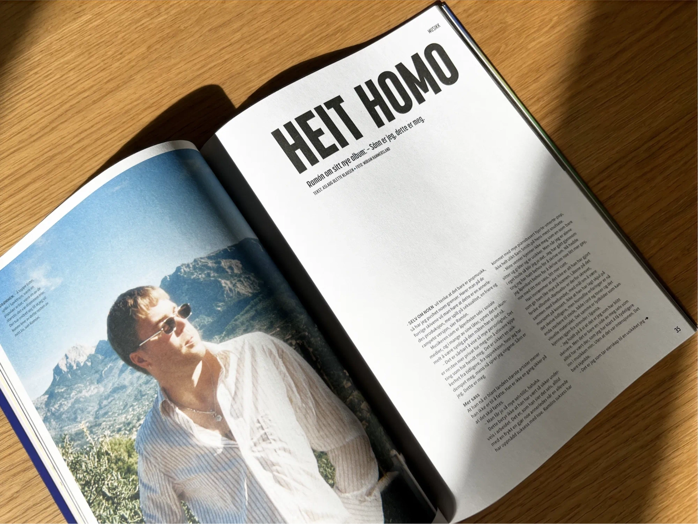 Oppslag i magasinet med overskriften «Heit homo» og et portrettbilde av en mann med solbriller foran et fjellandskap